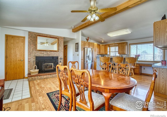 19150 E 195th Ave, Hudson, CO 80642 - dining space featuring a ceiling fan, lofted ceiling with beams, and light wood-style flooring