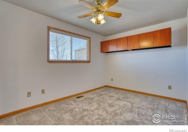 19150 E 195th Ave, Hudson, CO 80642 - carpeted spare room featuring baseboards, ceiling fan, and visible vents