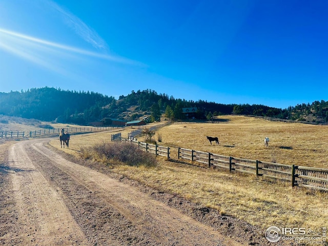 view of street featuring a rural view