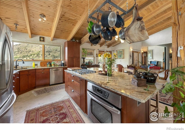 kitchen featuring vaulted ceiling with beams, wood ceiling, light tile patterned floors, sink, and stainless steel appliances