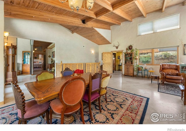 dining room featuring light tile patterned flooring, beam ceiling, a towering ceiling, and wooden ceiling