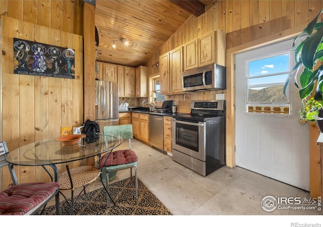 kitchen featuring appliances with stainless steel finishes, wooden ceiling, vaulted ceiling, light brown cabinets, and light tile patterned floors