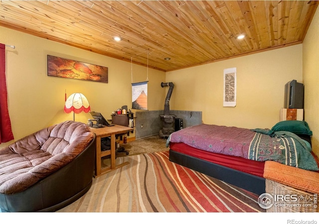 carpeted bedroom with wood ceiling and a wood stove