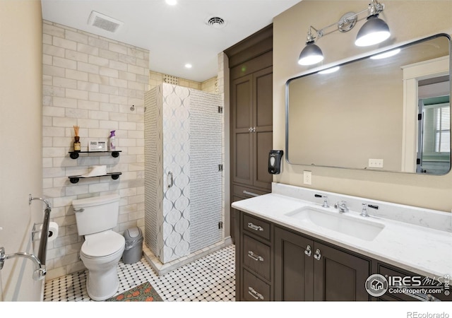 bathroom with vanity, a shower with curtain, tile walls, and toilet