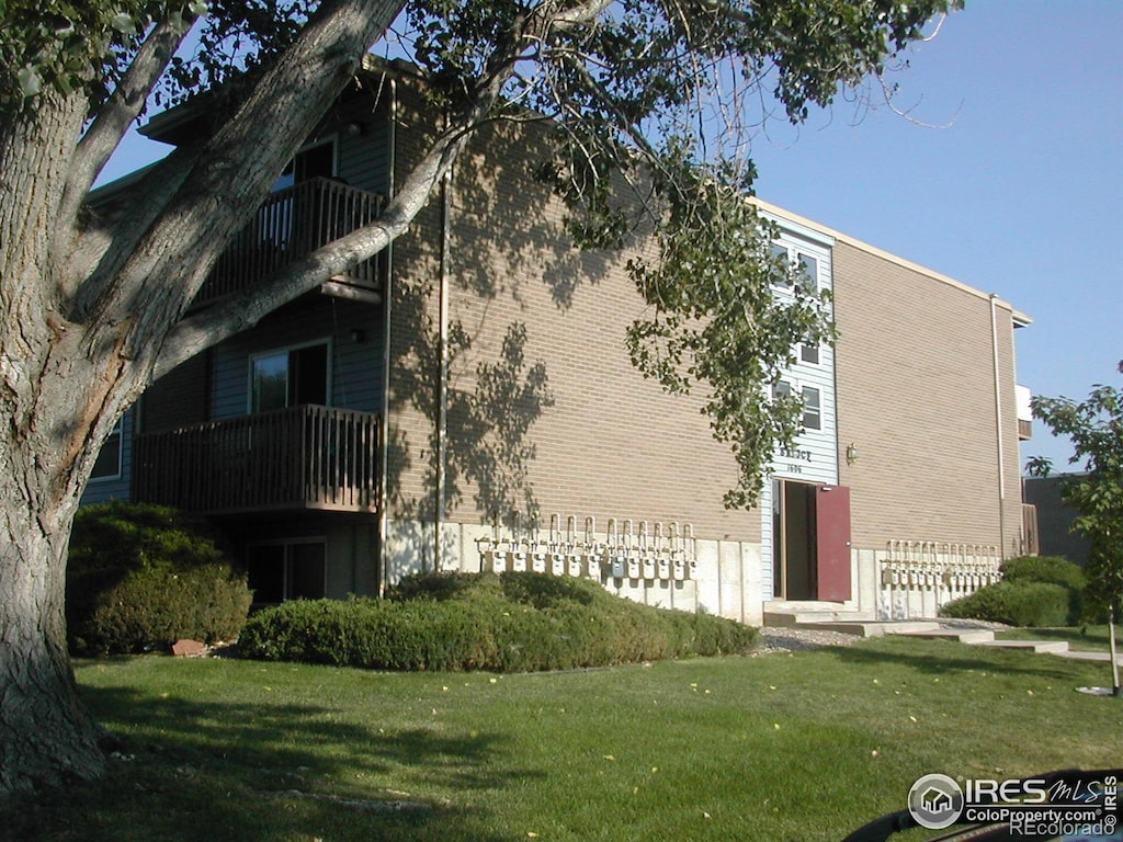 view of building exterior with fence