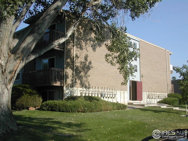 view of building exterior with fence