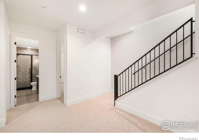 foyer with carpet