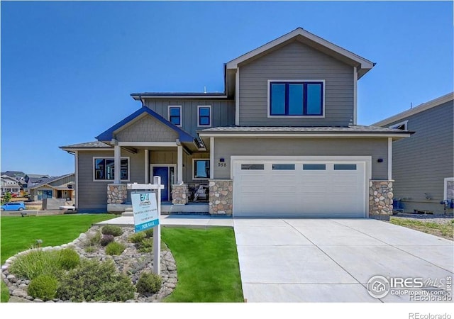 view of front facade featuring a garage and a front lawn