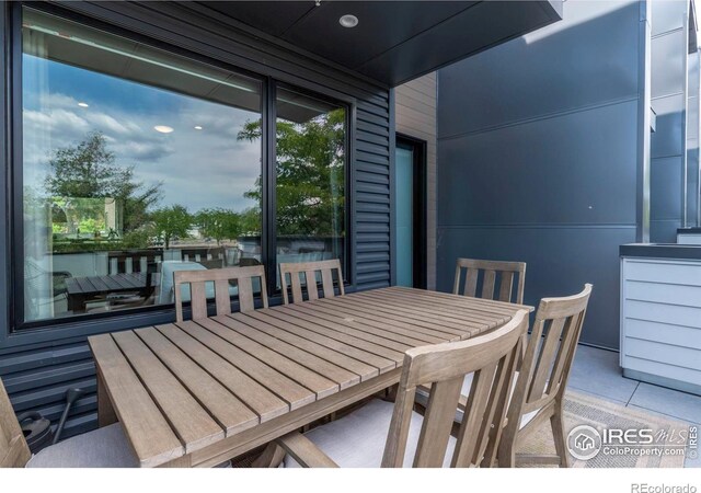 dining space with light tile patterned floors