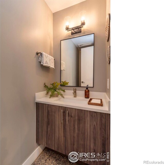 bathroom with vanity and tile patterned floors