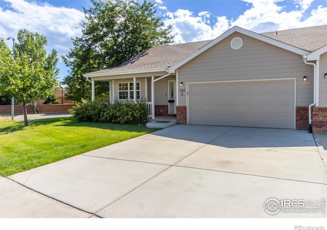 view of front of house with a garage and a front yard