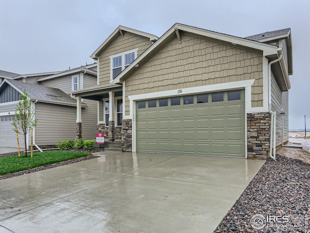 craftsman-style home featuring a garage