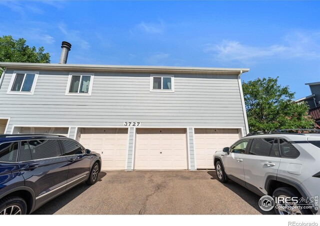 view of home's exterior with a garage