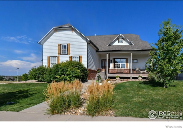 view of front of house featuring a porch and a front lawn