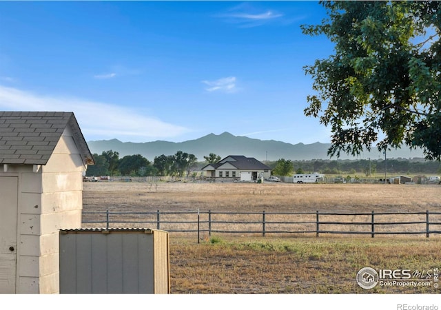 view of mountain feature featuring a rural view