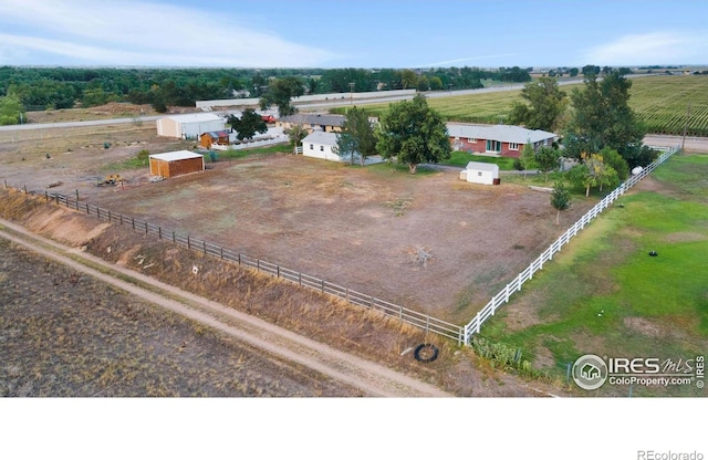 birds eye view of property featuring a rural view