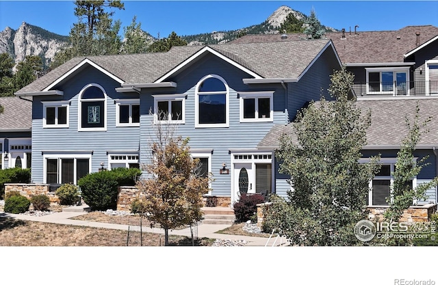 view of front of house featuring a mountain view