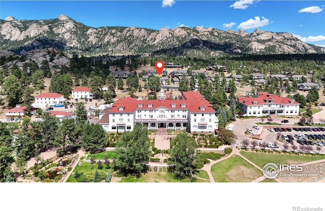 drone / aerial view featuring a mountain view