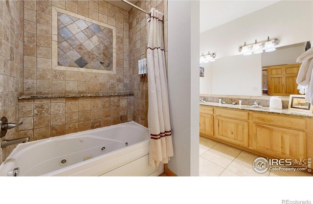 bathroom featuring shower / bath combination with curtain, vanity, and tile patterned floors