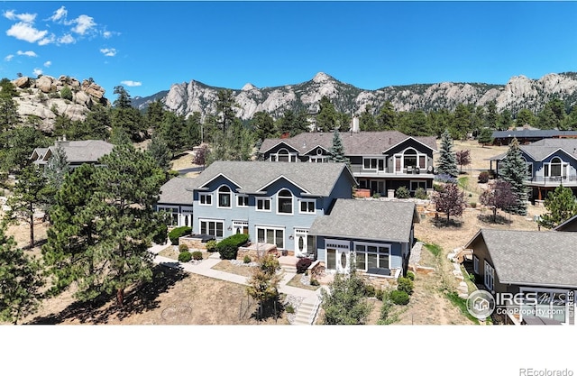 view of front of home with a mountain view