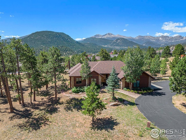 view of front of home featuring a mountain view