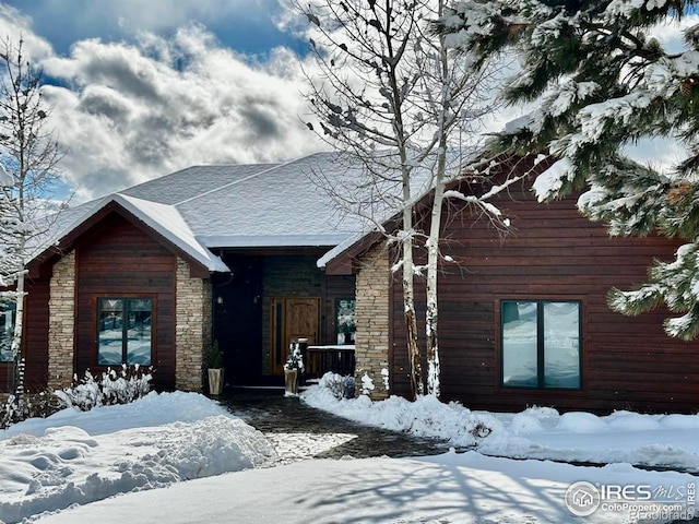 view of front of property featuring stone siding