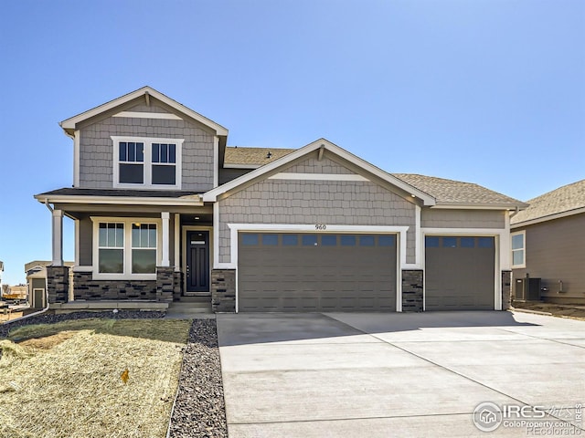 craftsman inspired home featuring a garage