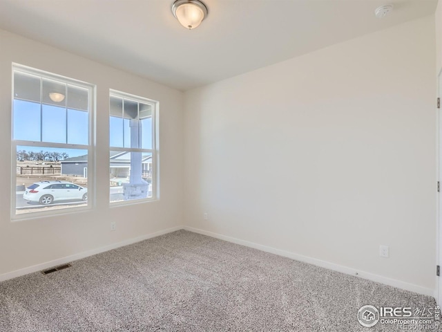 view of carpeted spare room