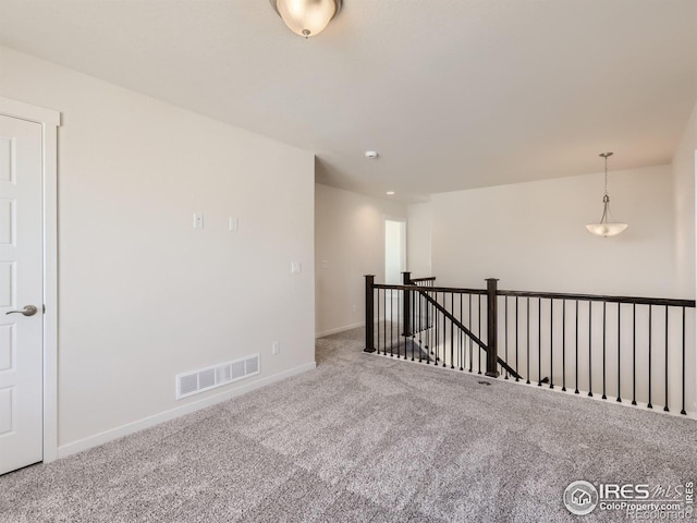 empty room featuring carpet