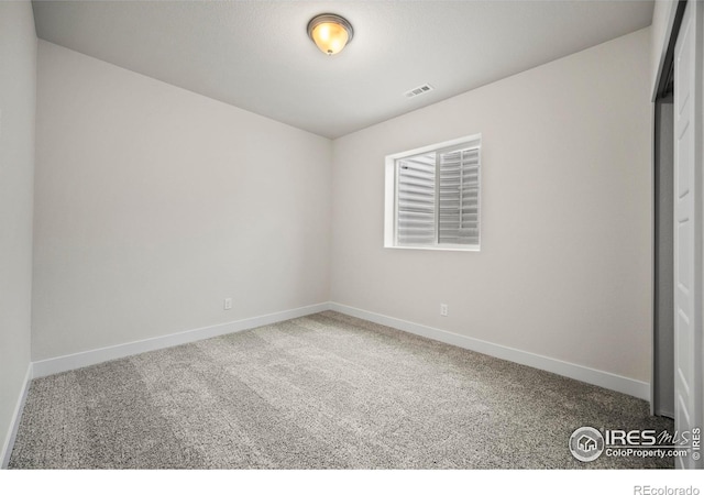 empty room with carpet floors