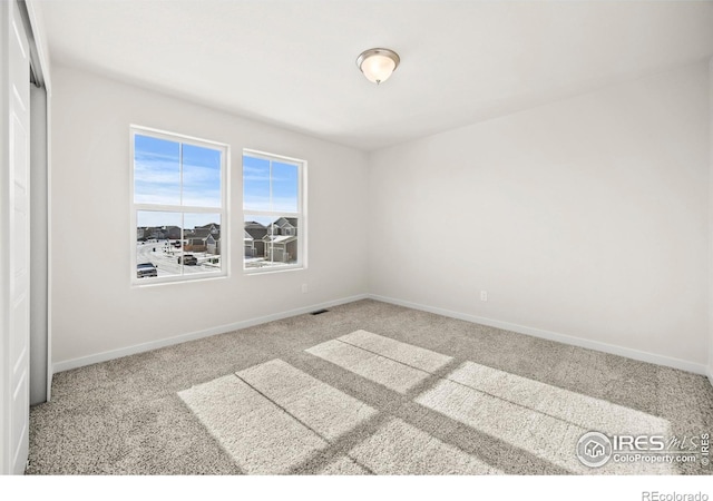 view of carpeted empty room