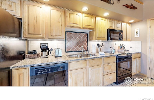 kitchen featuring sink, decorative backsplash, light brown cabinetry, light tile patterned floors, and black appliances