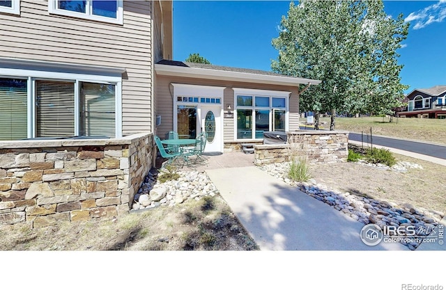 349 Overlook Ln, Estes Park, CO 80517 - doorway to property featuring stone siding