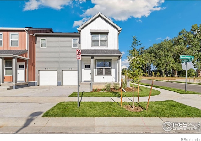 view of front of property with a garage