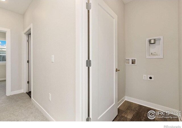 laundry area with hookup for an electric dryer, wood-type flooring, and hookup for a washing machine