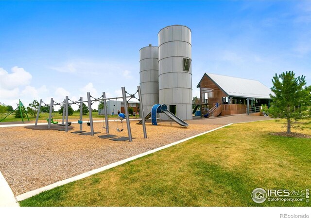 view of jungle gym featuring a yard