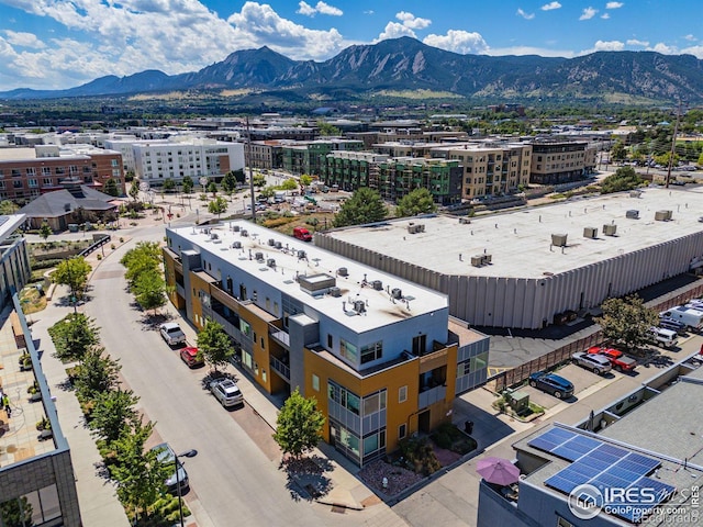 drone / aerial view featuring a mountain view