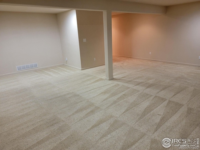 basement with light carpet