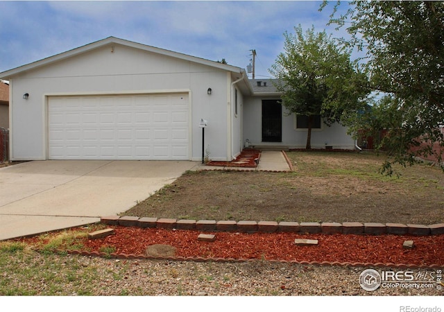 ranch-style home with a garage