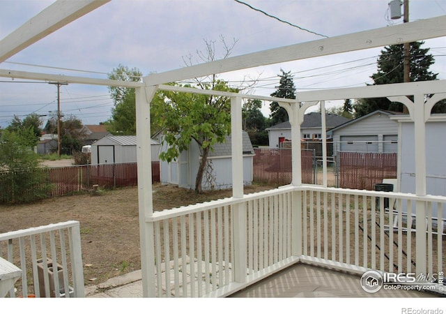 exterior space with a storage shed