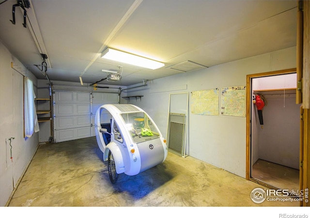 garage featuring a garage door opener