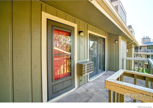 doorway to property featuring a balcony