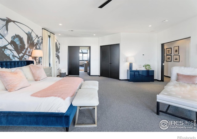 carpeted bedroom featuring ceiling fan