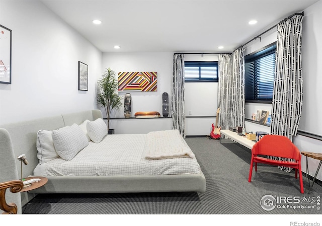 bedroom featuring carpet