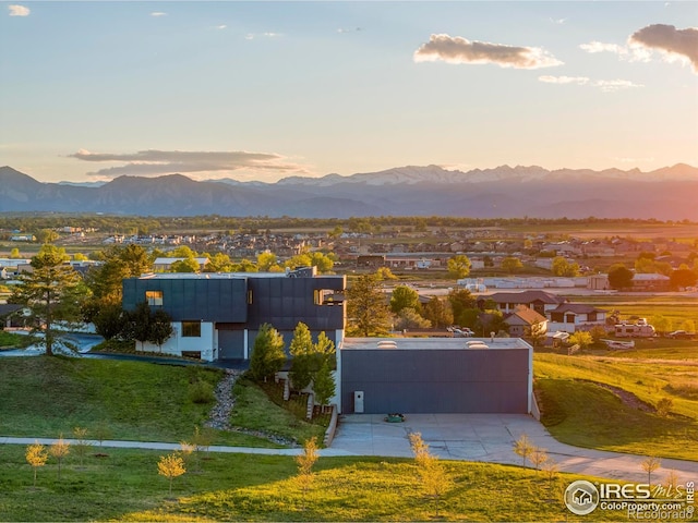 aerial view at dusk with a mountain view