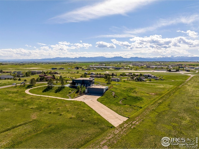 bird's eye view with a mountain view and a rural view