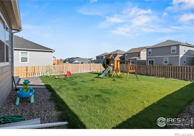 view of yard featuring a playground