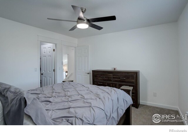 carpeted bedroom featuring ceiling fan