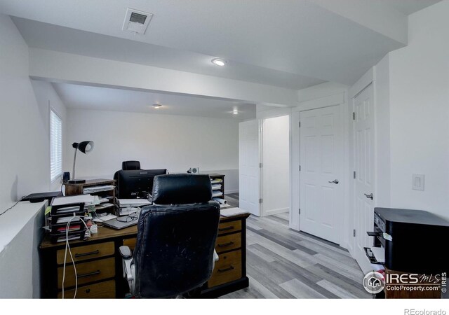 office space featuring light hardwood / wood-style floors