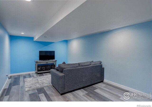 living room with wood-type flooring